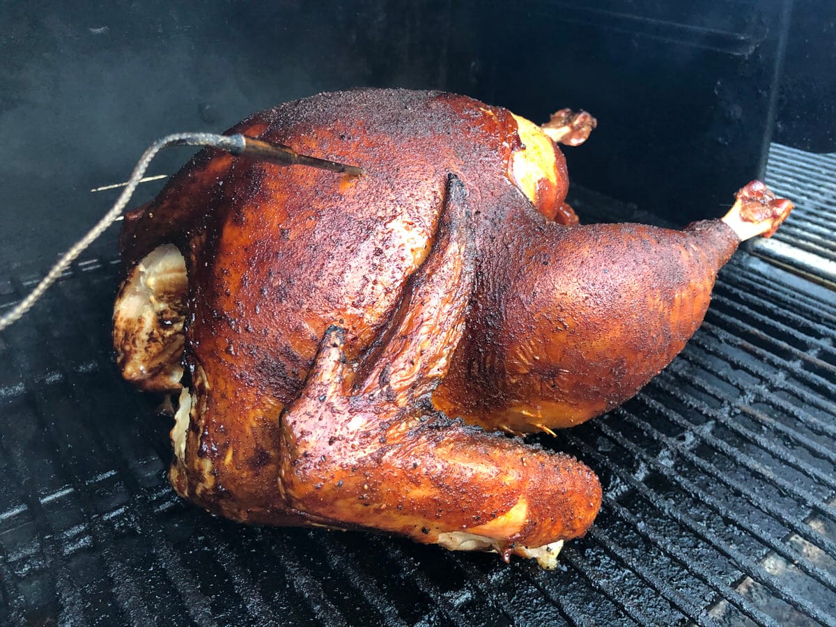 Turkey cooked on MAK 2 Star pellet grill on bottom rack with SuckleBusters Texas Pecan Seasoning