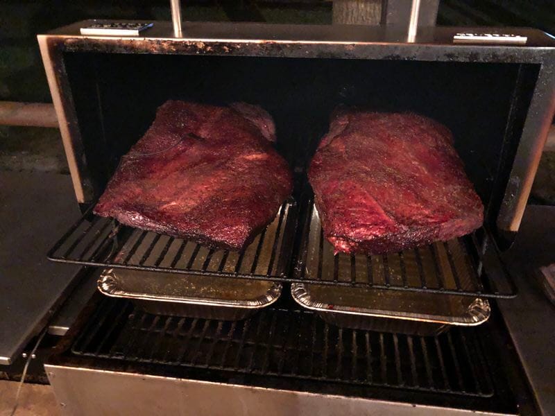 Upper full grate on MAK 2 Star pellet grill holds two packer briskets with no problem at all.