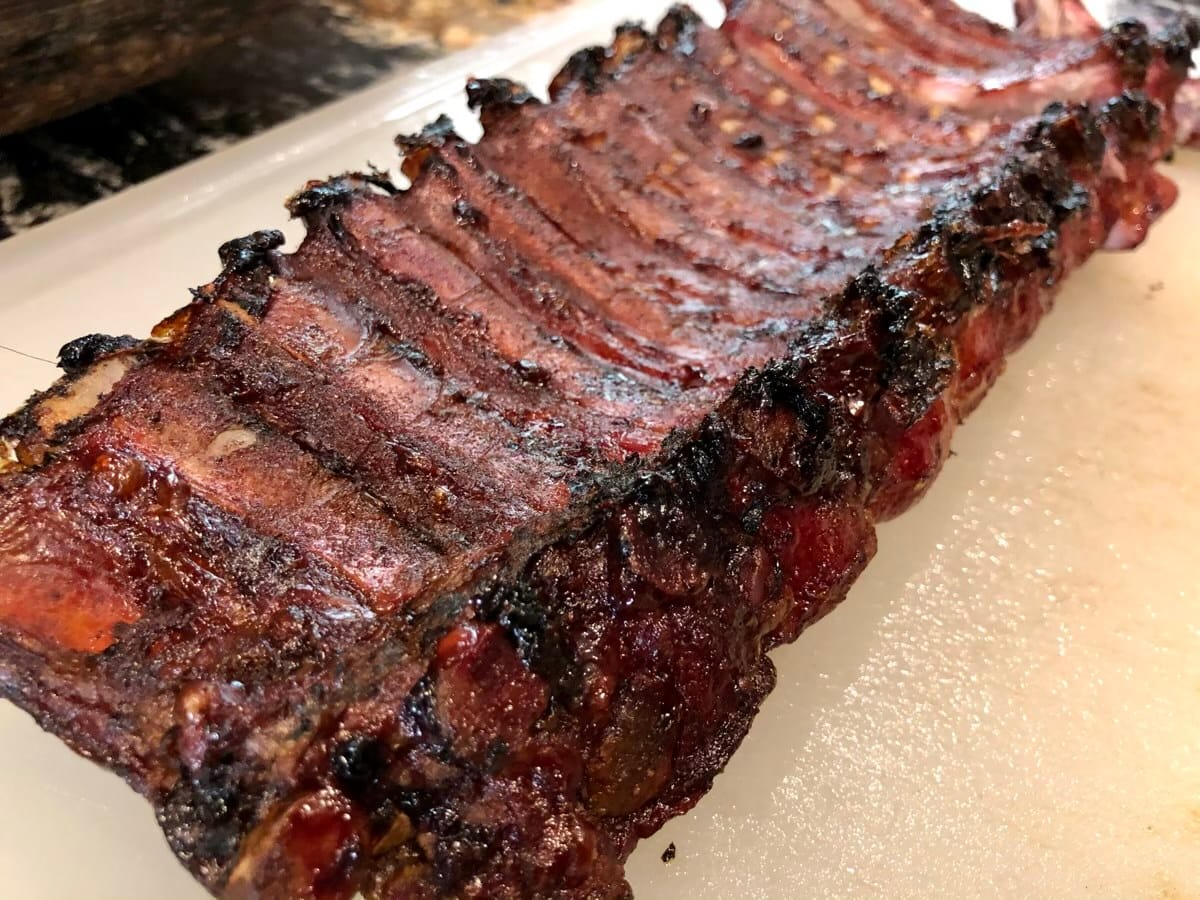 These baby back ribs rendered out beautifully on the upper rack of the MAK 2 Star pellet grill. The ends of the bones had crisp black ends and the membrane came off like a thin chicharron. Yum!