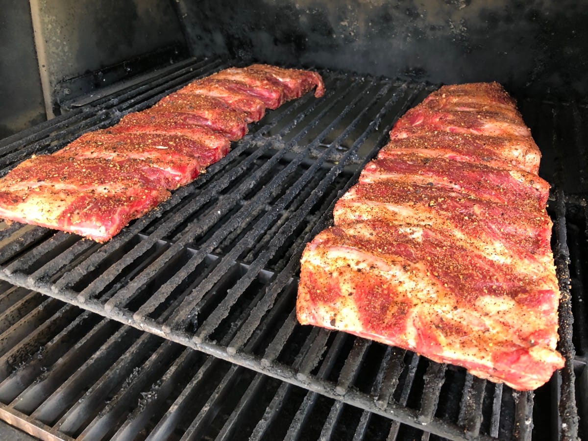 Seasoned beef finger ribs on top rack of MAK 2 Star pellet grill