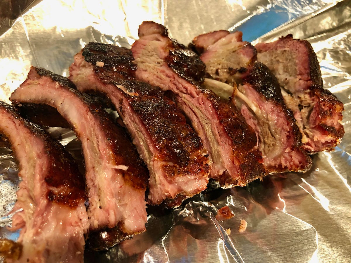 Hog Waller baby back ribs cooked to perfection on the Pit Barrel Cooker.