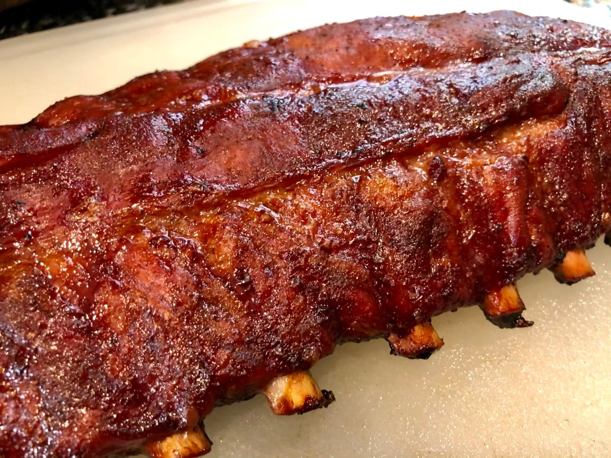 The meat pulled up nicely on the bone while the exterior of the baby back ribs had a beautiful mahogany finish thanks to the SuckleBusters Texas Pecan seasoning and smoke profile of the MAK 2 Star General pellet grill. 