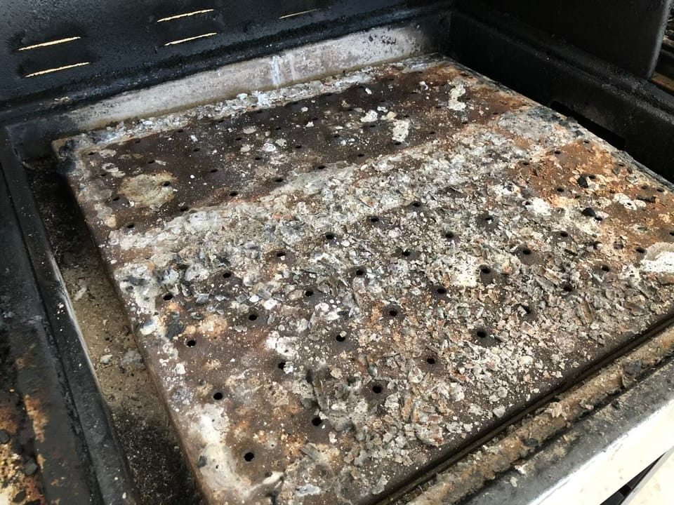 All grease is incinerated on the FlameZone when the grill is running at over 800F at grate level.