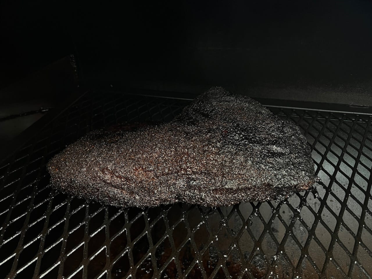 Brisket smoking on Mill Scale 94 offset smoker.