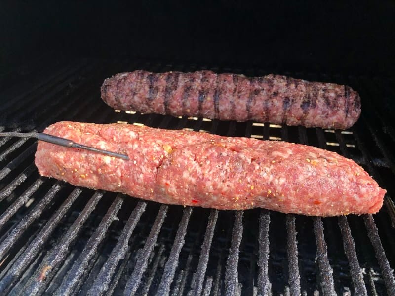 (2) 1 lb breakfast fatty's with cinnamon crumb cake stuffed inside on the upper rack of the MAK 2 Star pellet grill.