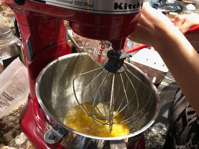 Mixing ingredients for pecan pies.