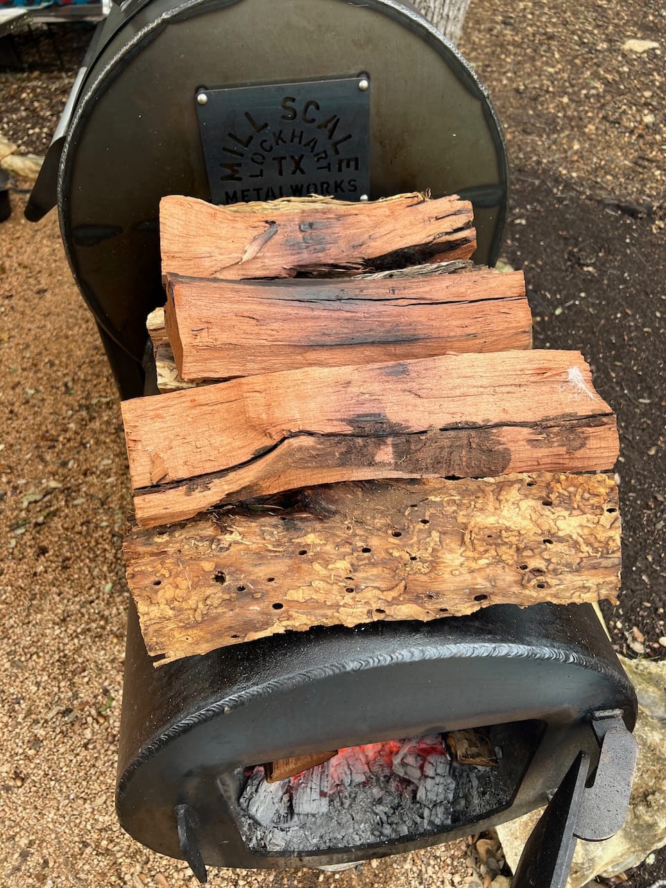 Preheating wood splits on top of Mill Scale 94 firebox.