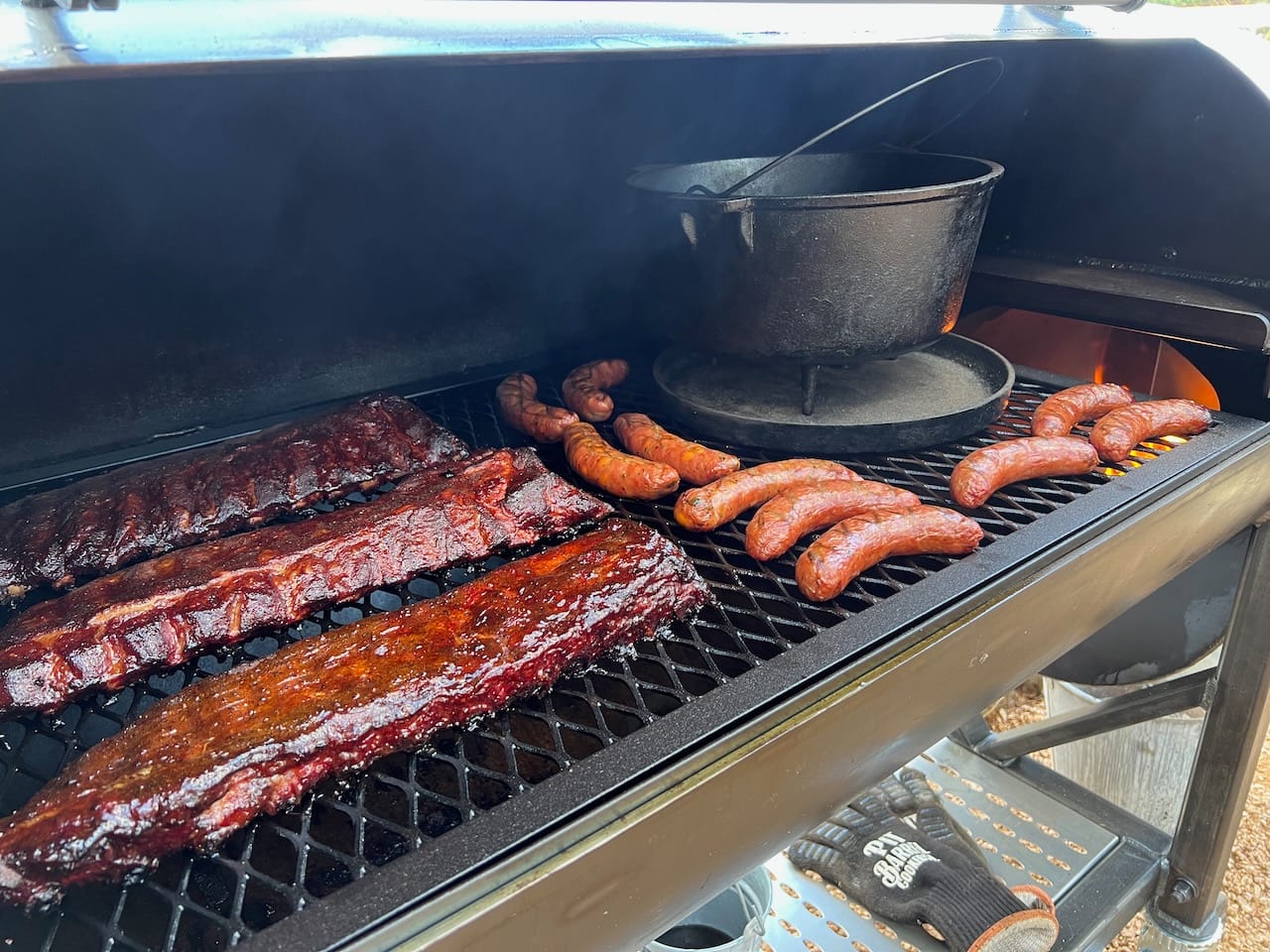 Baby back ribs, sausage, and pinto beans on the Mill Scale 94 offset smoker.