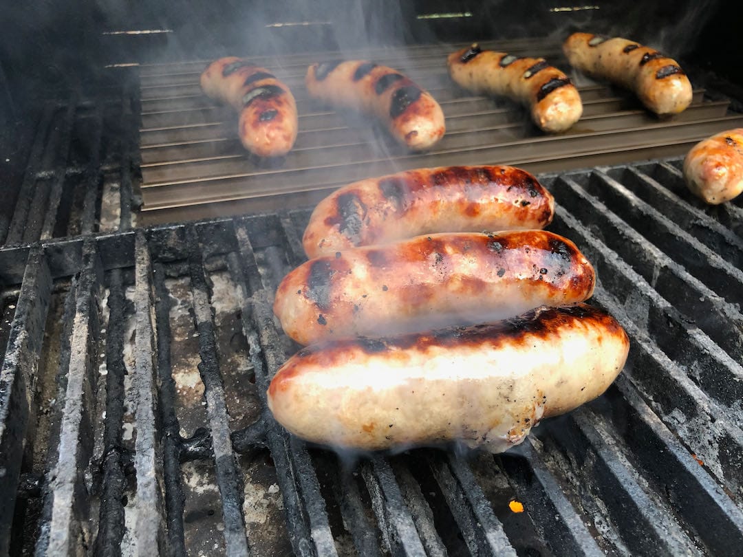 Grilled sausages on MAK and Grill Grate Brand Searing Grates.