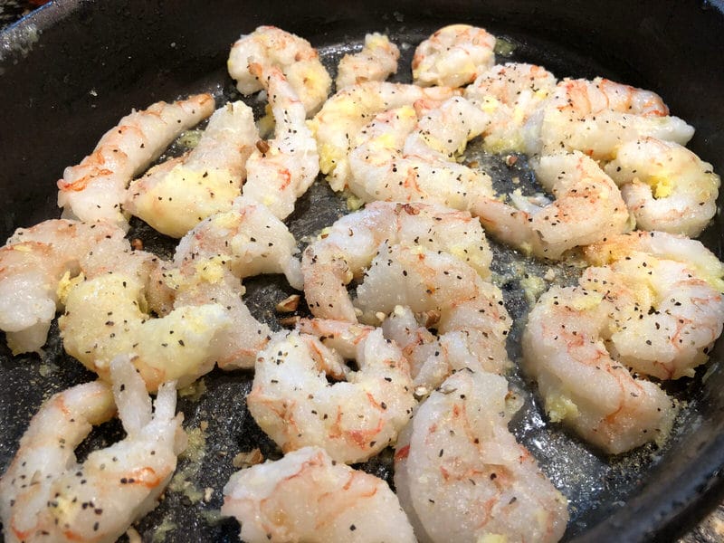 Fresh Argentine Wild Caught shrimp cooking in garlic butter