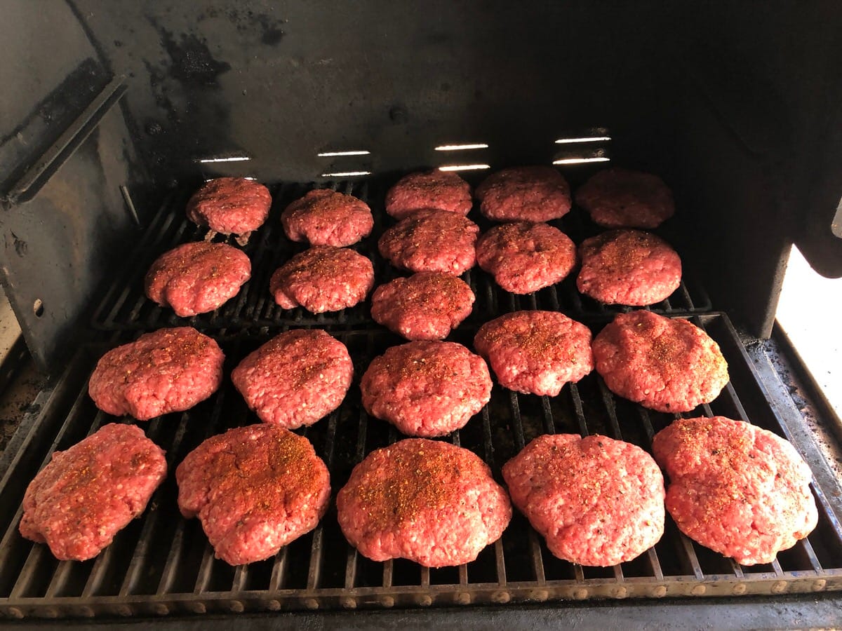 21 hamburgers on the bottom rack of MAK 2 Star pellet grill. If you had the upper full rack in you coud easily cook over 40 hamburgers at once.